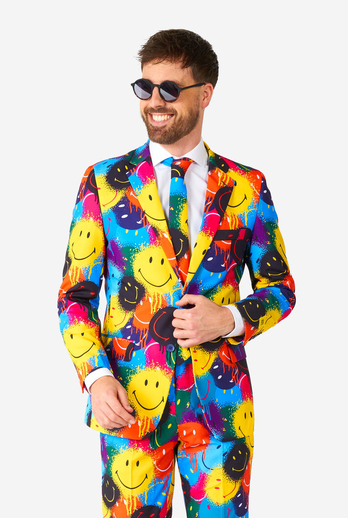 Man wearing colorful men's suit with Smiley print