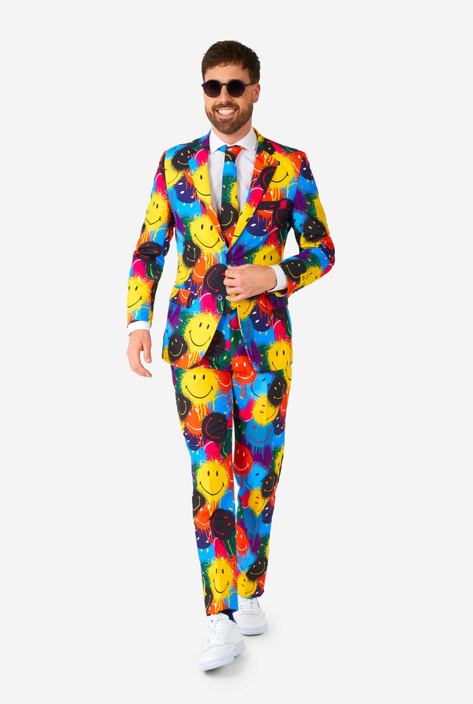 Man wearing colorful men's suit with Smiley print