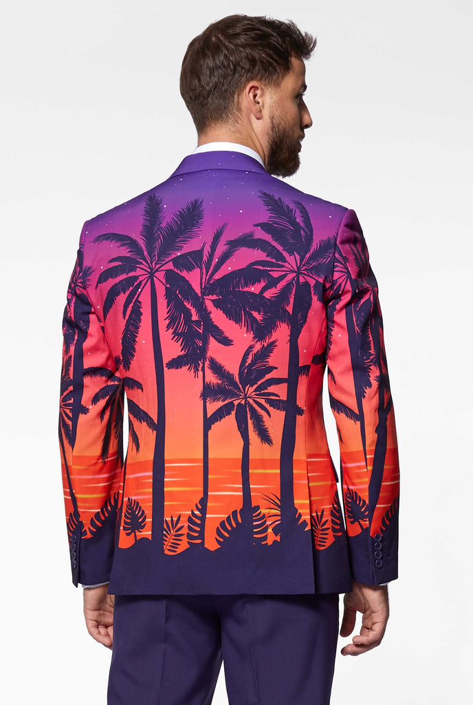 Man wearing Suave Sunset Hawaiian suit view from back