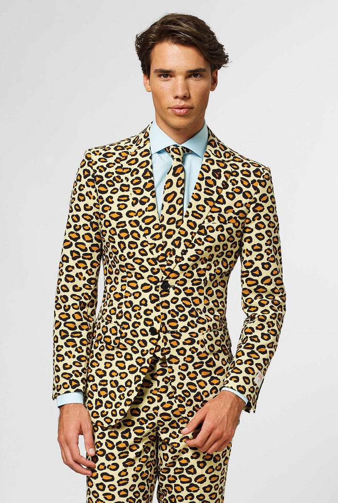 Man wearing men's suit with panther print