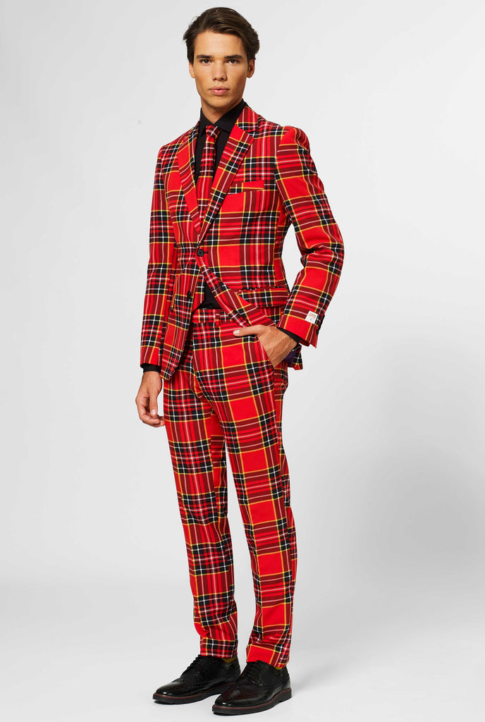 Man wearing red Christmas tartan men's suit