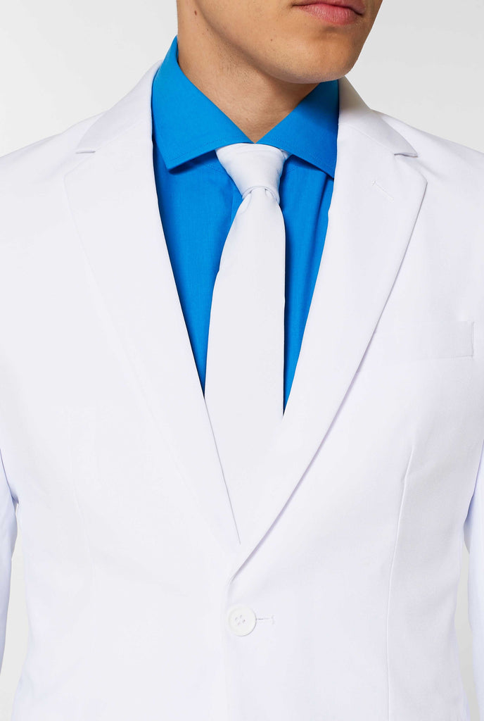 All white men's suit worn by man up close