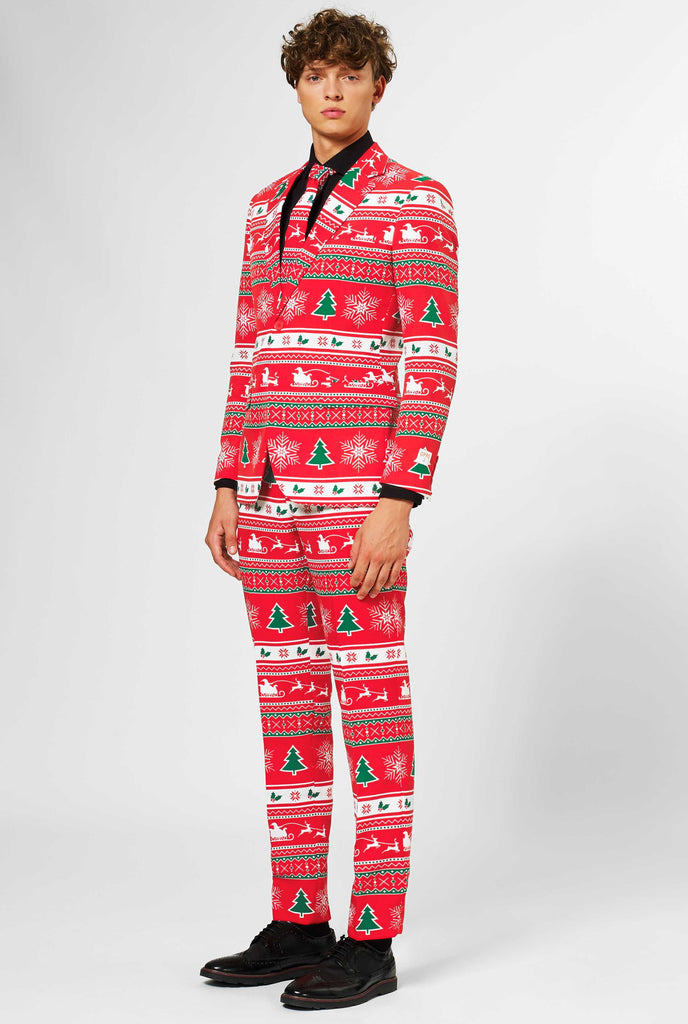 Man wearing red Christmas suit and black dress shirt