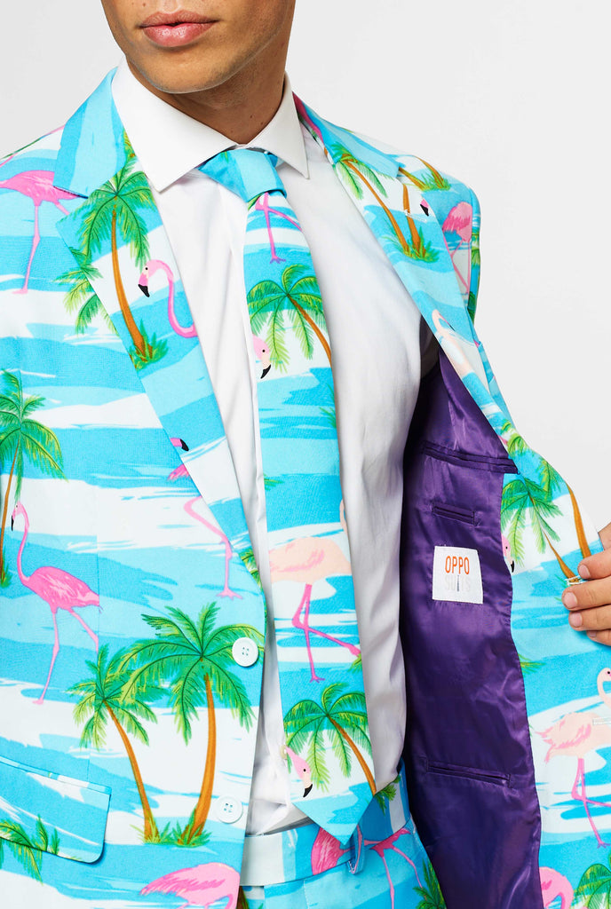 Man wearing summer suit with tropical flamingo print, close up