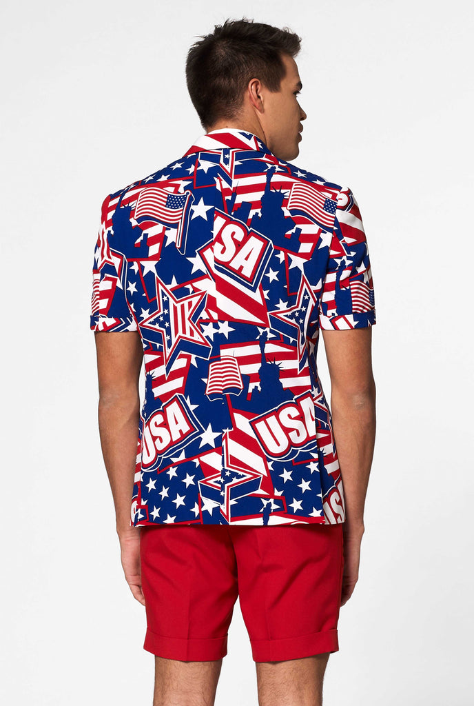 Man wearing USA themed summer suit, view from the back