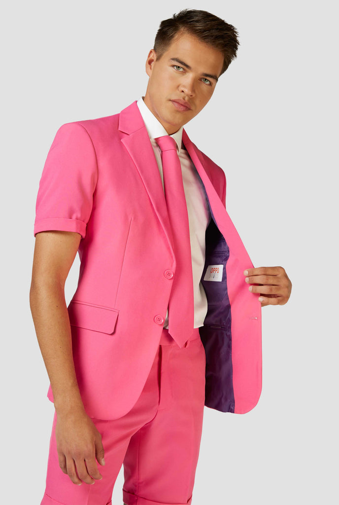 Man wearing pink summer suit