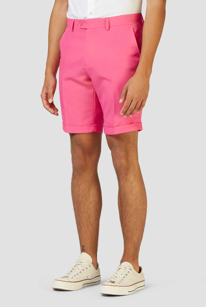 Man wearing pink summer suit, close up of pants