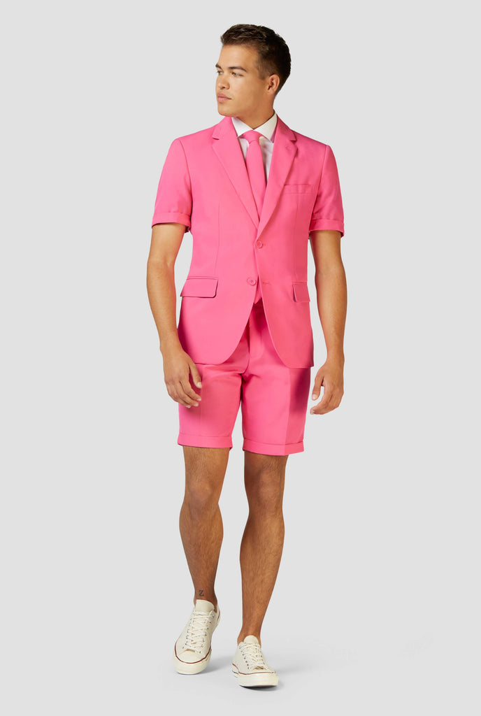 Man wearing pink summer suit