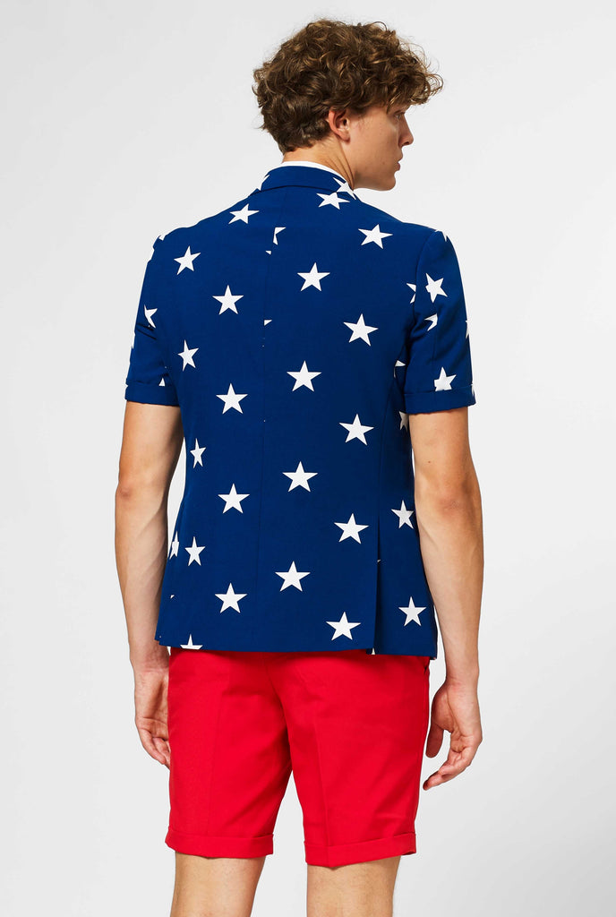 Man wearing USA themed summer suit, view from the back