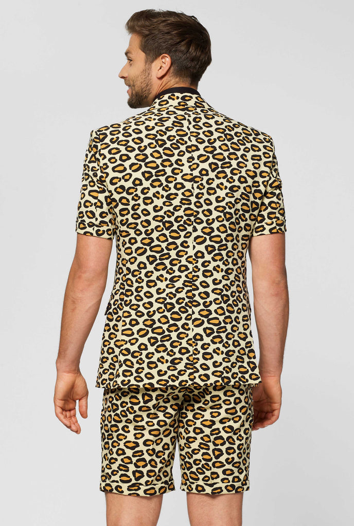 Man wearing summer suit with leopard print, view from the back