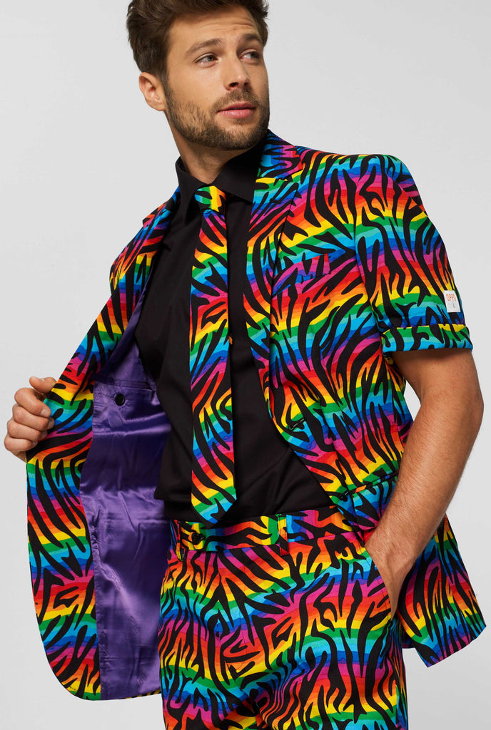 Man wearing summer suit with rainbow zebra stripes print