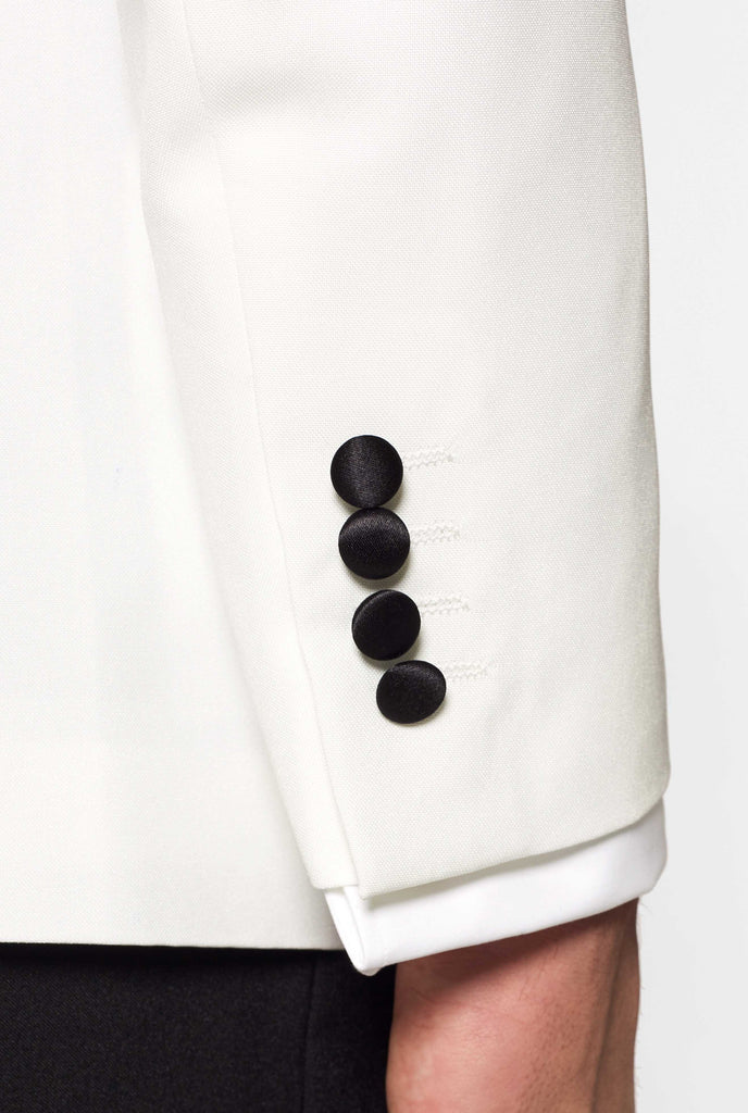 White with black tuxedo suit Pearly White worn by man close up sleeve black buttons