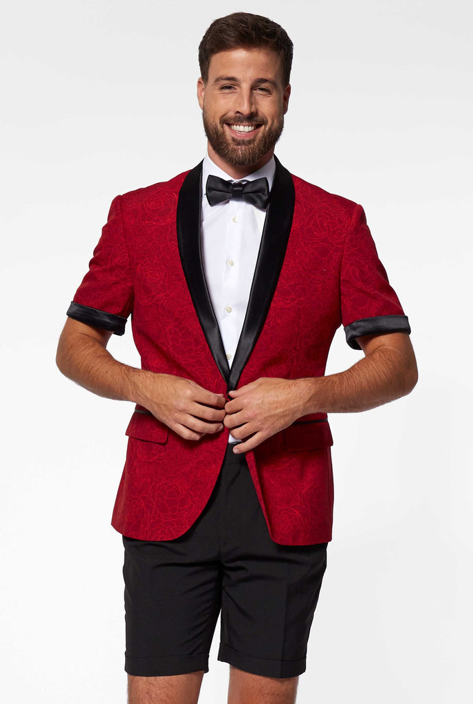  Man wearing red summer tuxedo with flower print