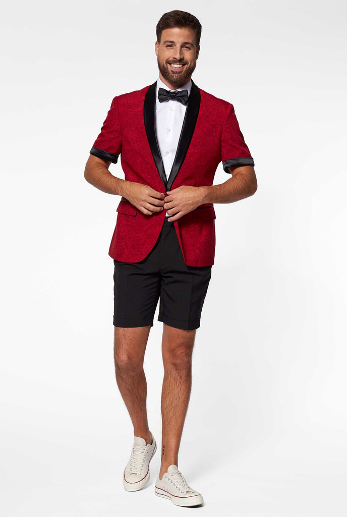 Man wearing red summer tuxedo with flower print