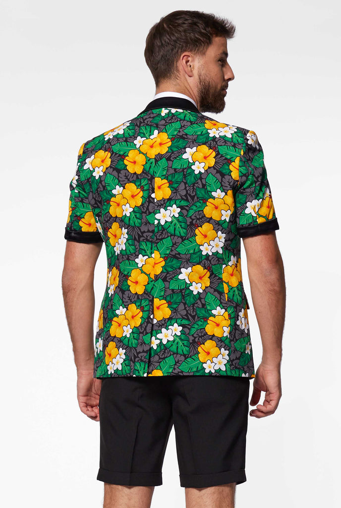 Man wearing summer tuxedo with flower print view from back