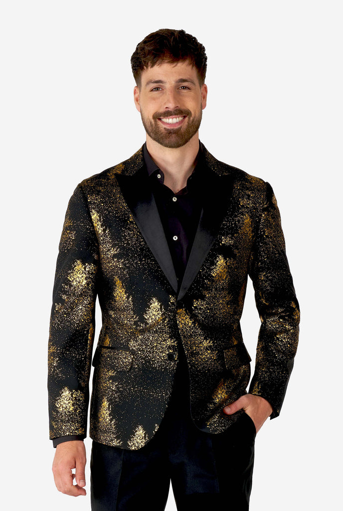 Man wearing black blazer with golden Christmas tree print