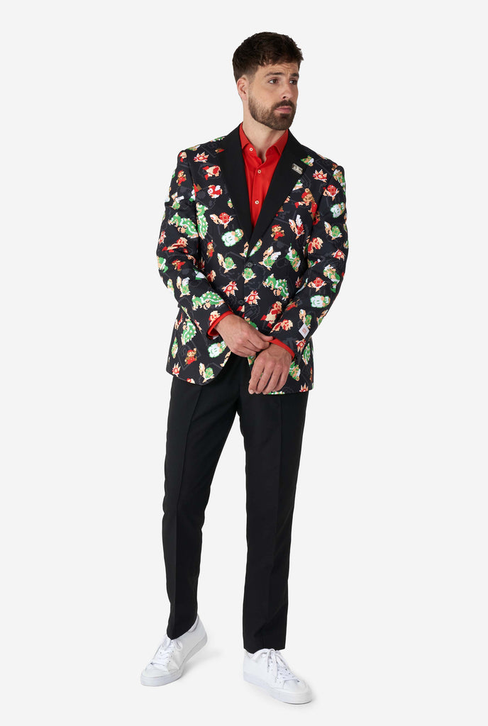 Man wearing black blazer with retro Super Mario characters print