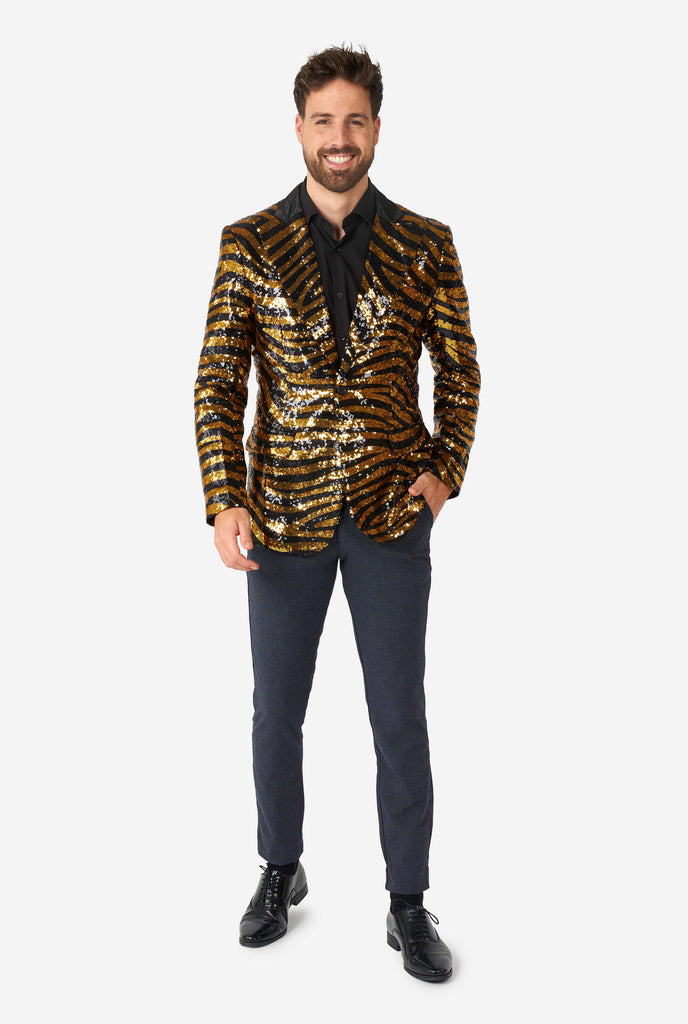 Man wearing black and gold sequins tiger stripe blazer