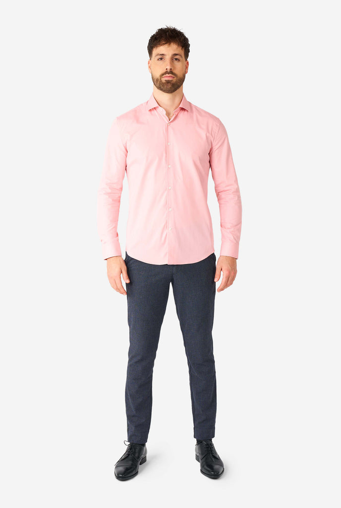 Man wearing soft pink dress shirt