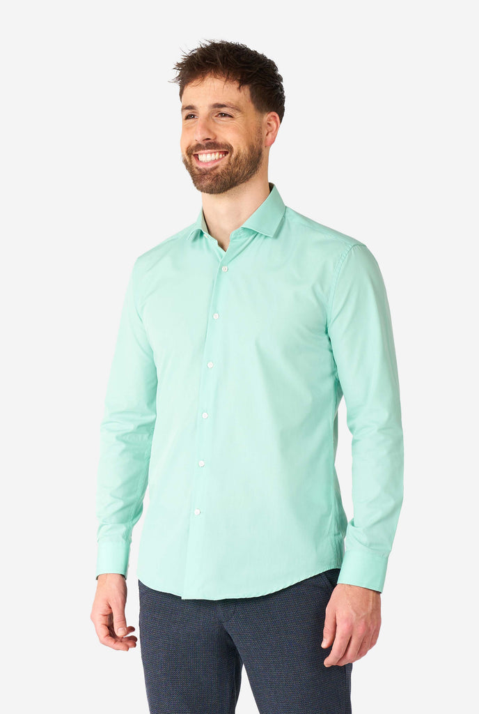 Man wearing mint green dress shirt