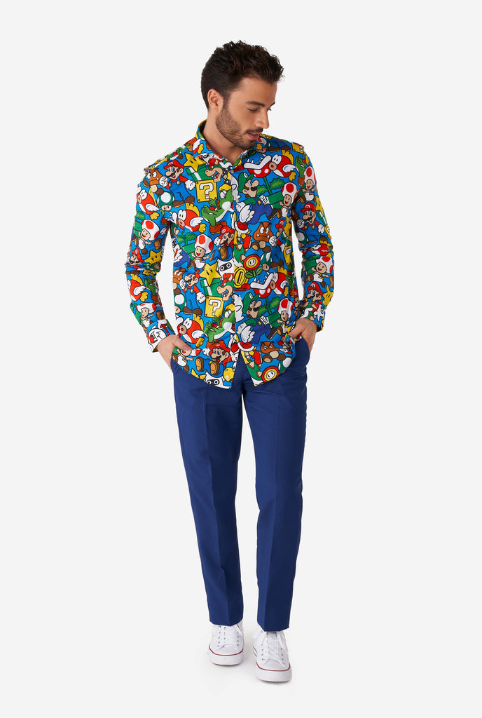 Man wearing dress shirt with Super Mario icons print