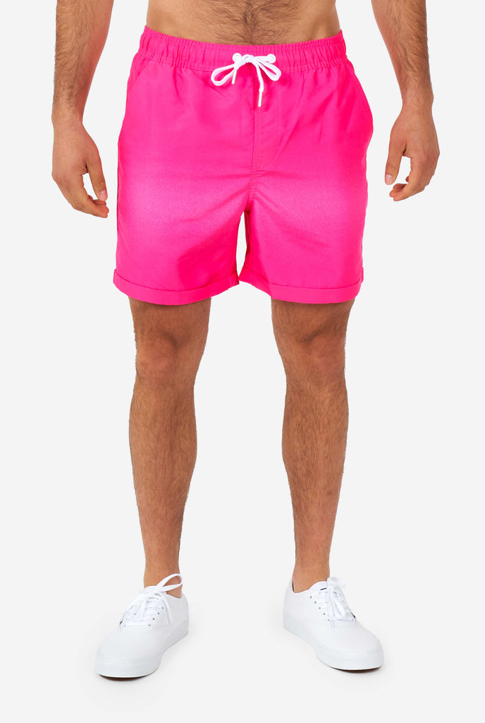 Man wearing pink summer shorts