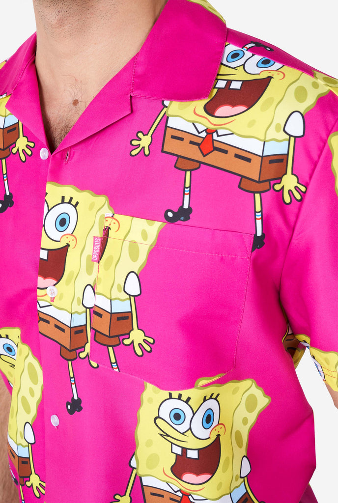 Man wearing summer outfit with SpongeBob SquarePants print, shirt close up