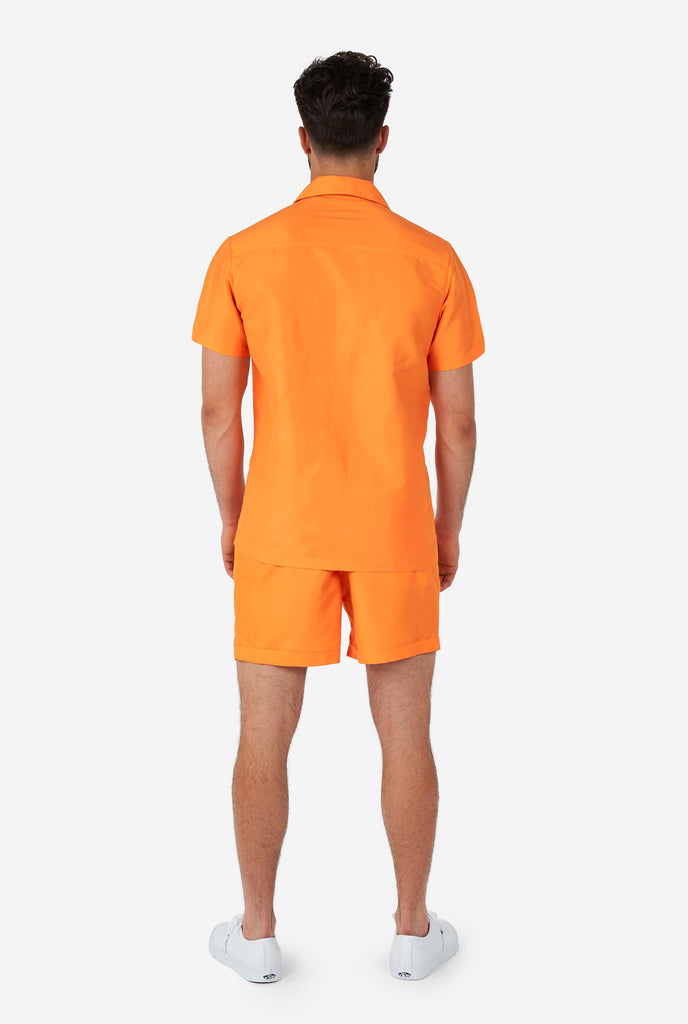 Man wearing Orange Summer set, view from the back