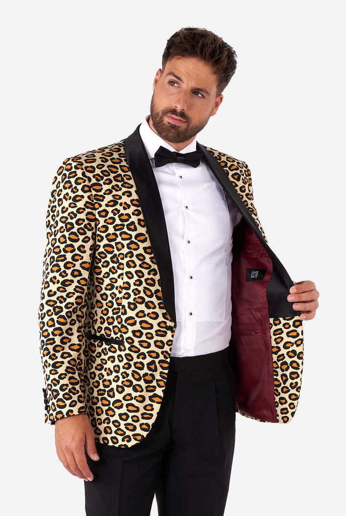 Man wearing tuxedo with jaguar print jacket