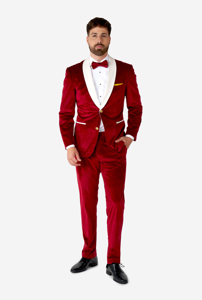 Man wearing red and white santa Christmas tuxedo