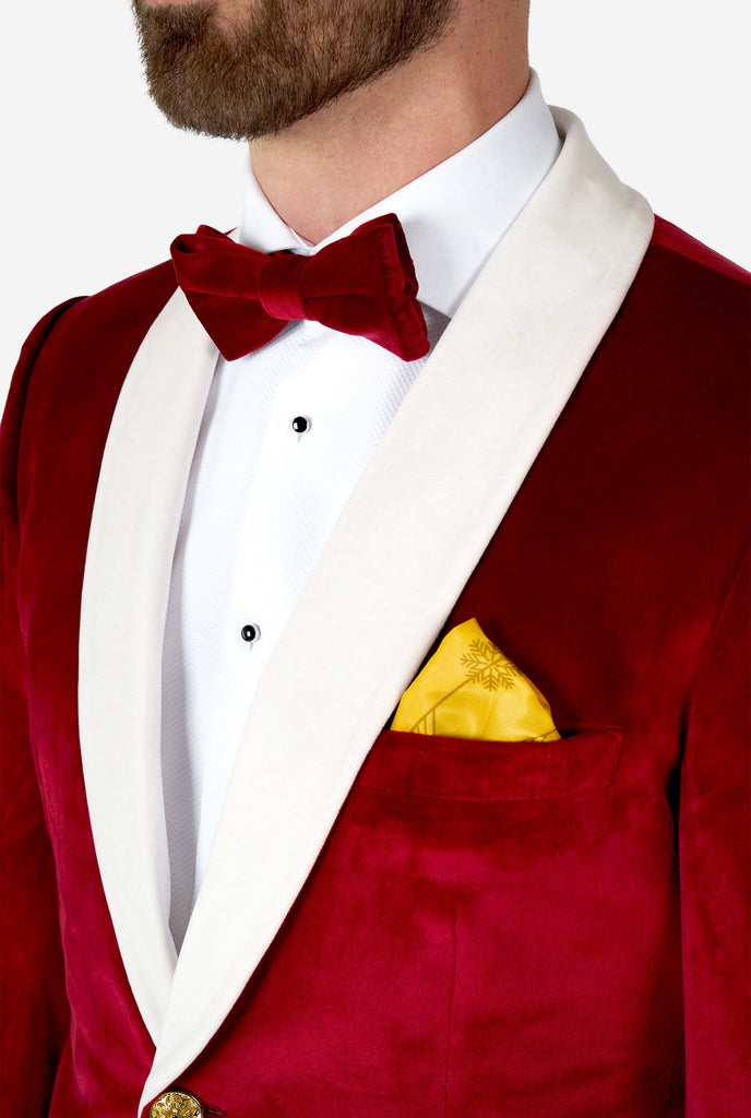 Man wearing red and white santa Christmas tuxedo