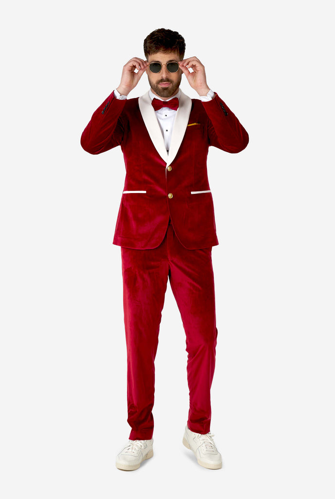 Man wearing red and white santa Christmas tuxedo