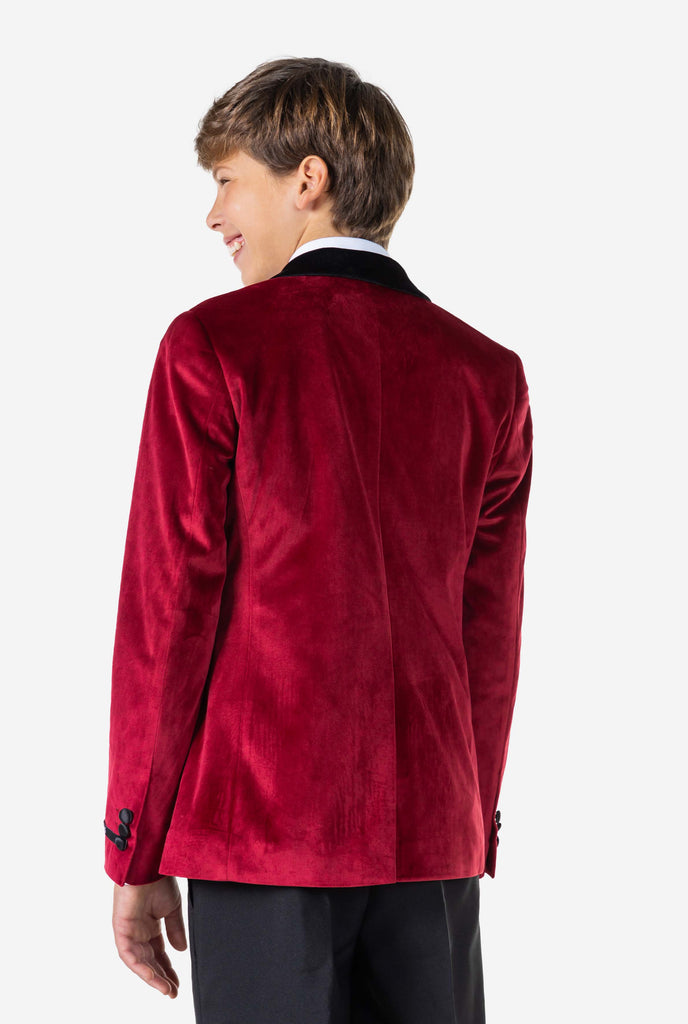 Teen wearing red velvet Christmas Dinner Jacket, view from the back