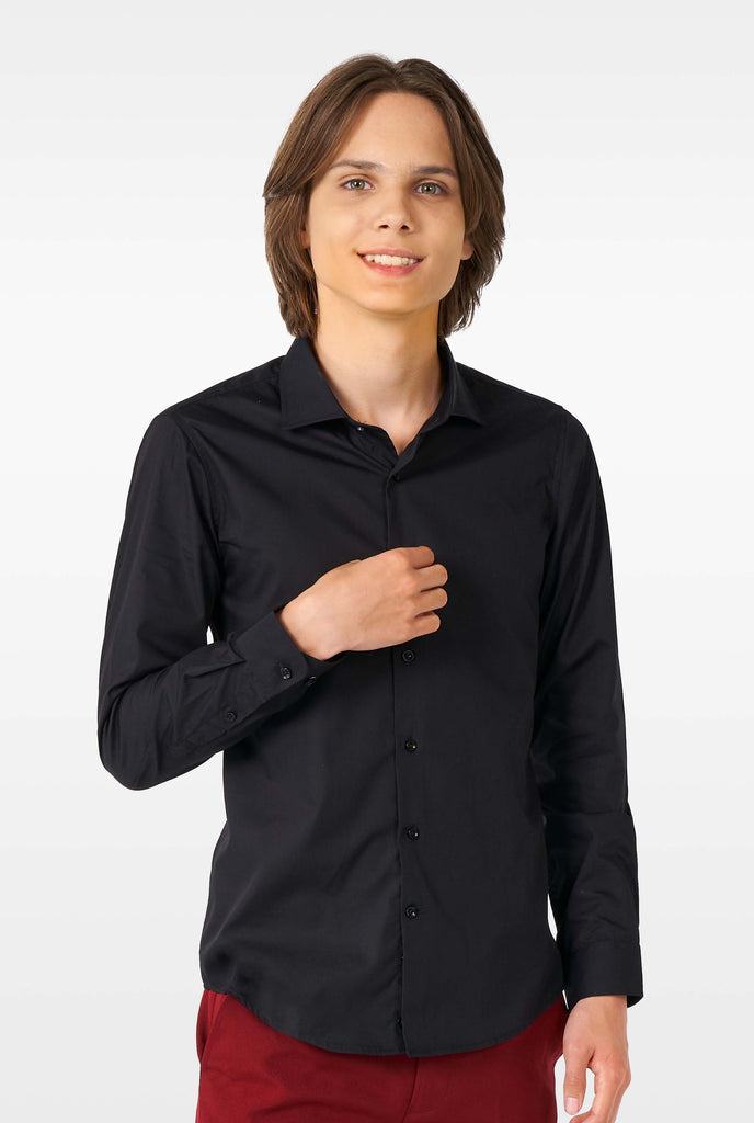 Teen wearing black dress shirt