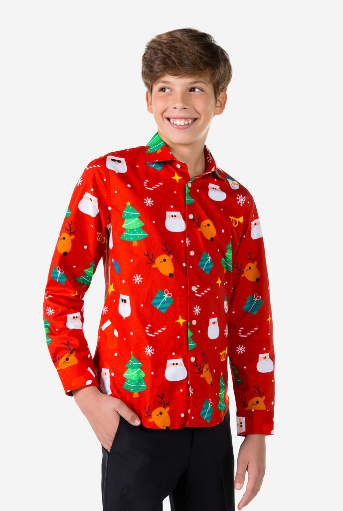 Teen wearing red dress shirt with Christmas print