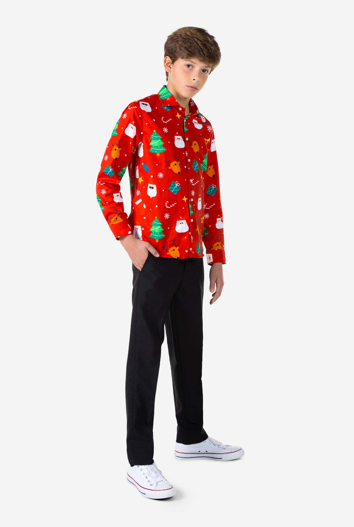 Teen wearing red dress shirt with Christmas print