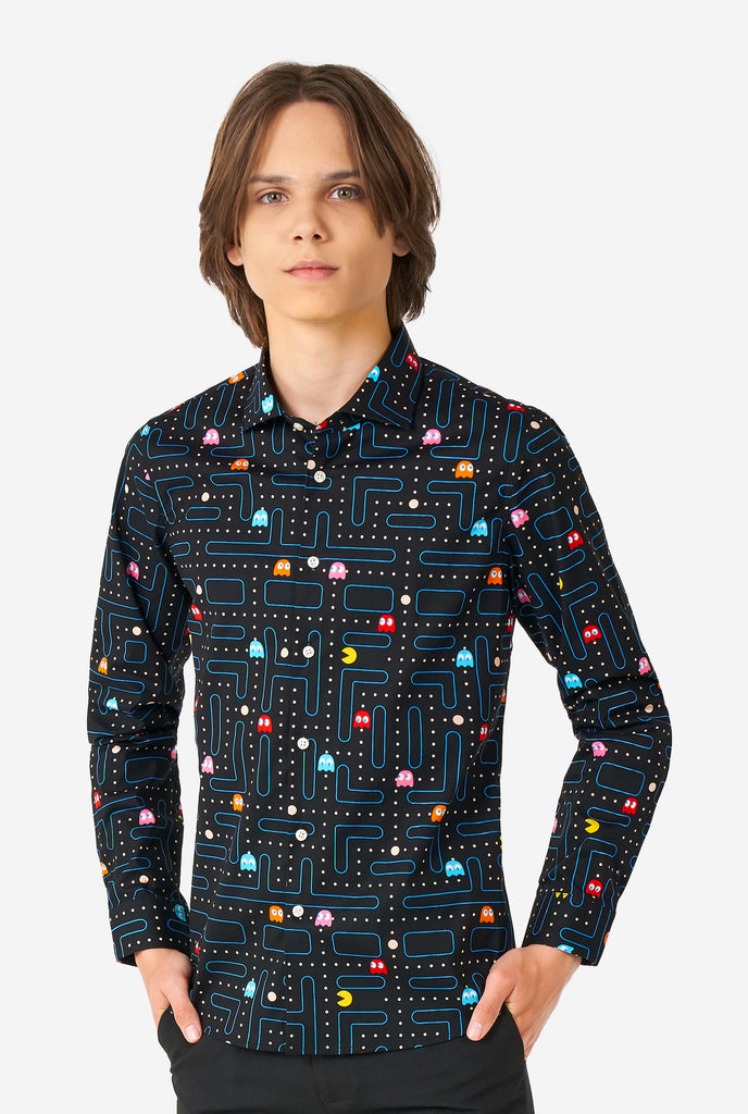 Teen wearing black dress shirt with Pac-Man print