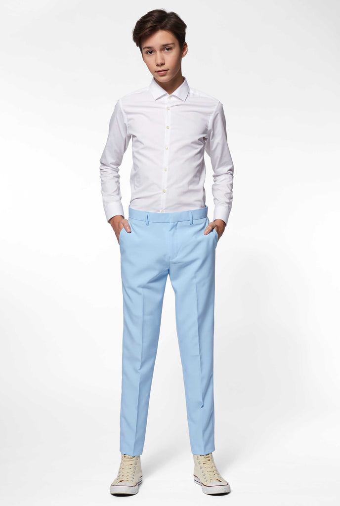 Teen wearing light blue formal suit, pants view