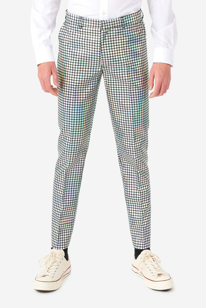 Teen wearing formal suit with mirror discobal print, zoomed in on pants