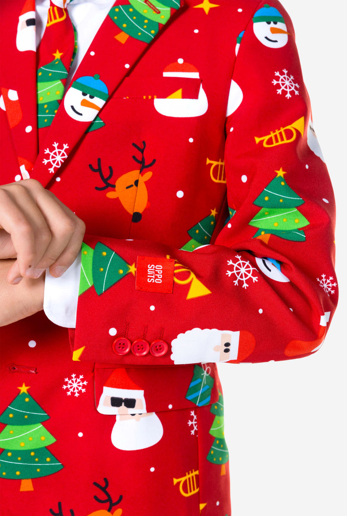 Teen wearing formal red Christmas suit, zoomed in