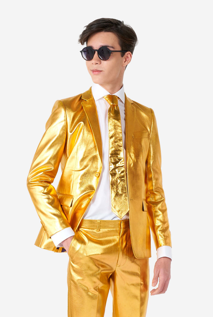 Teen wearing formal golden colored suit
