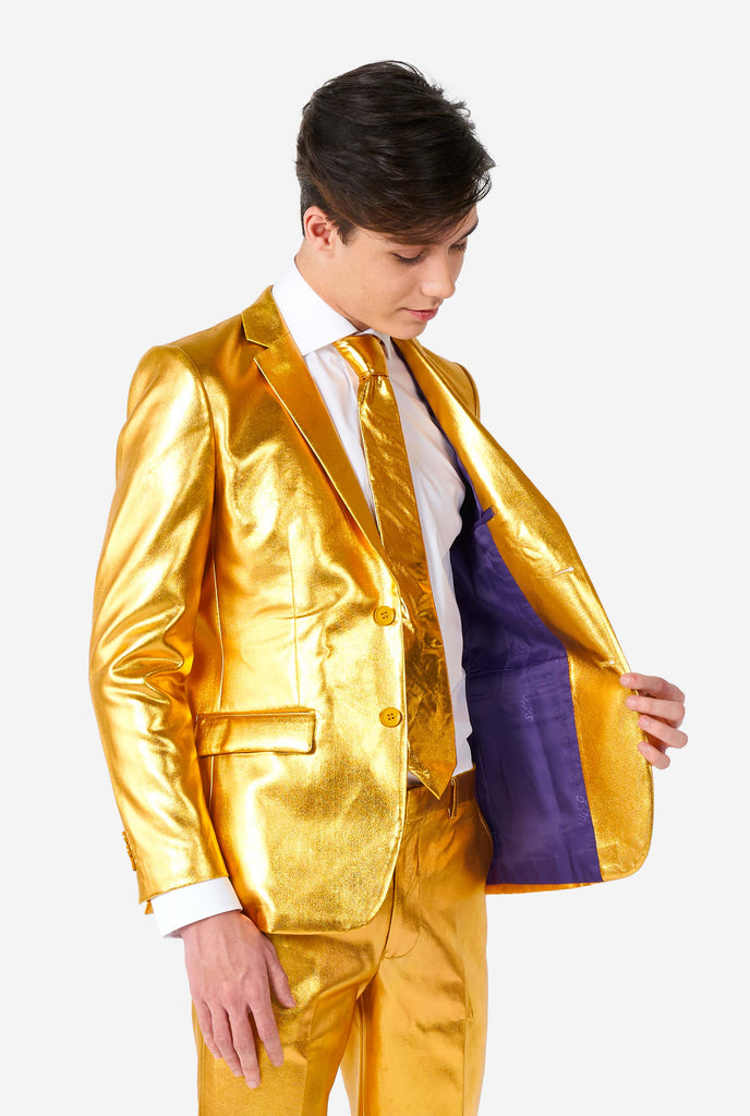 Teen wearing formal golden colored suit