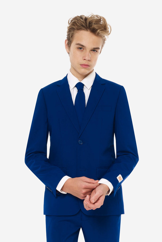 Teen wearing dark blue formal suit