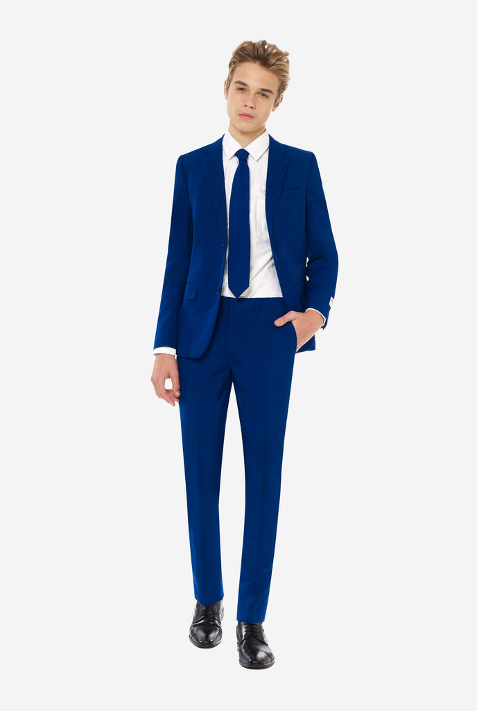 Teen wearing dark blue formal suit