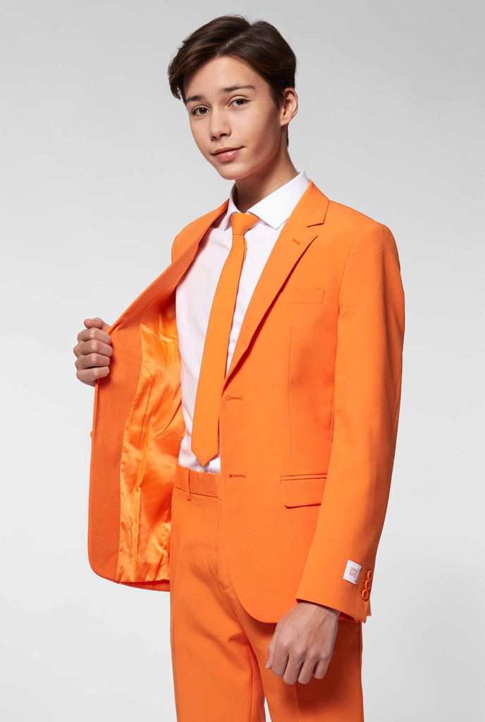 Teen wearing orange formal suit