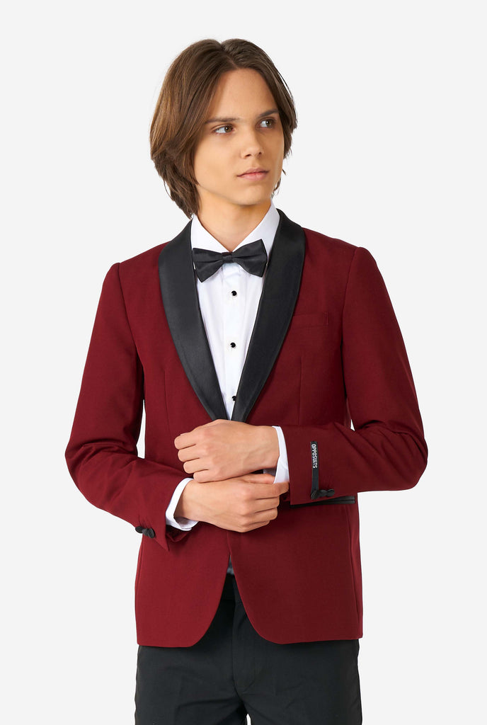 Teen wearing burgundy red and black tuxedo