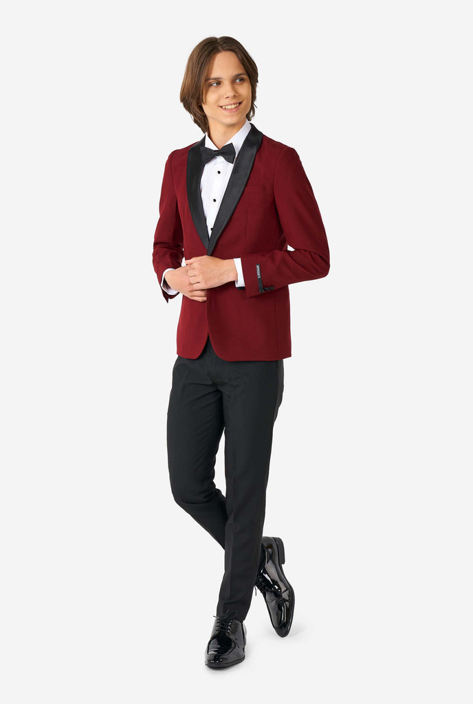 Teen wearing burgundy red and black tuxedo