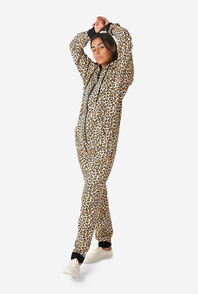 Woman wearing jaguar/ panther print onesie